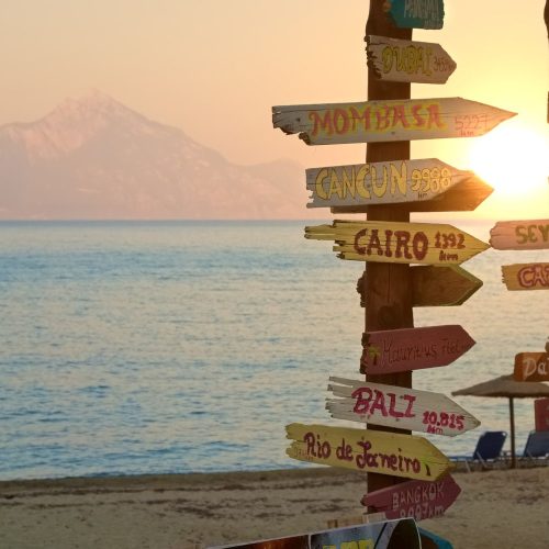 direction signpost with distance to many different dsm2g6v.jpg